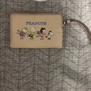 Coach X Peanuts ice skating wristlet